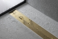 hansgrohe-raindrain-flex-element-zewnetrzny-zloty-optyczny-zblizenie-bok.jpg
